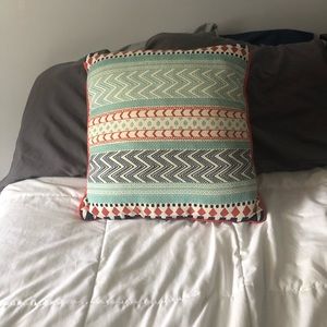 Reversible throw pillow